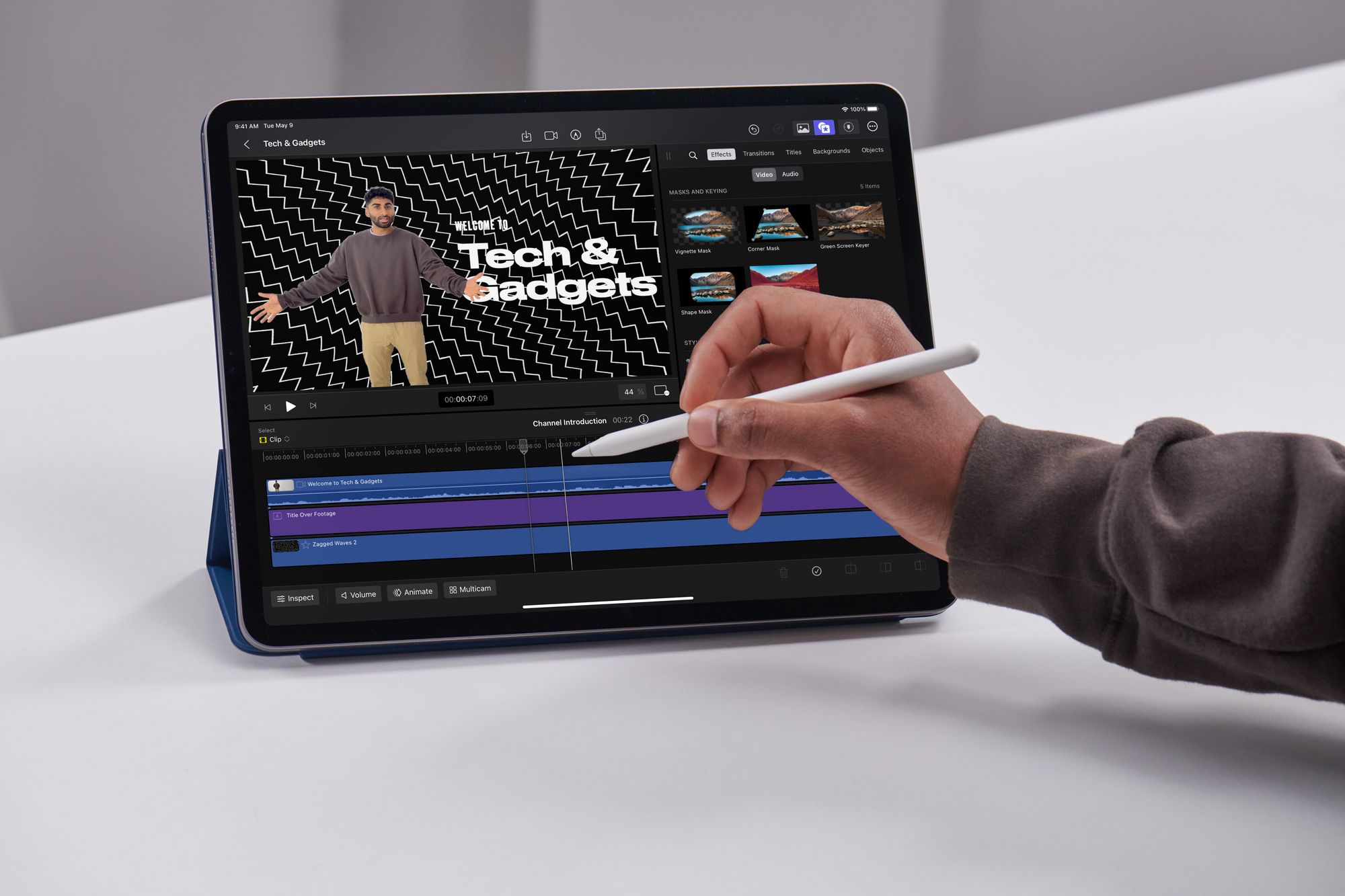 Person using an Apple Pencil on an iPad to navigate through Final Cut Pro
